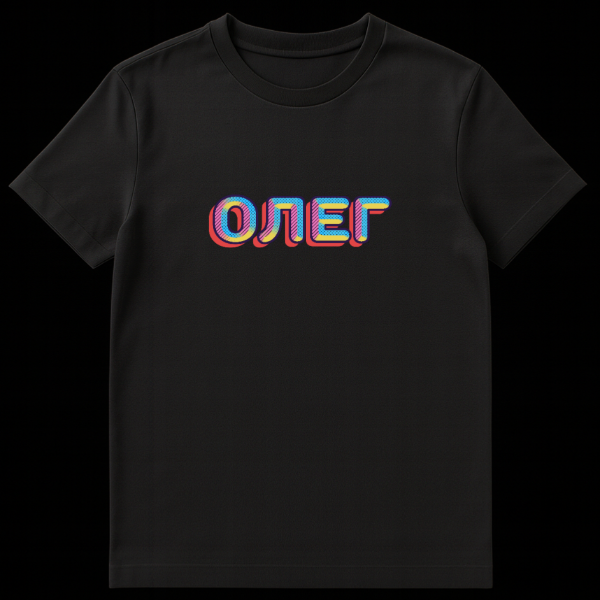 Close-up of a grey t-shirt featuring the Russian name 'ОЛЕГ' (Oleg) in a retro 80s pop art style. Letters are bold, outlined in dark blue, with a red 3D shadow, filled with pink, yellow, blue, and textured with stripes and polka dots. on black t-shirt